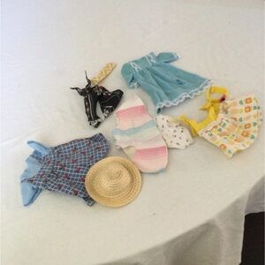 Charming Doll Dress Collection with Blue and Yellow Outfits